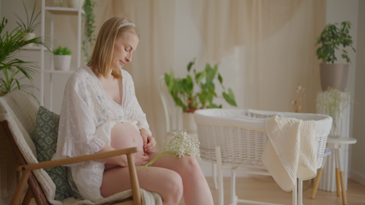 Expecting Mother by Baby Crib