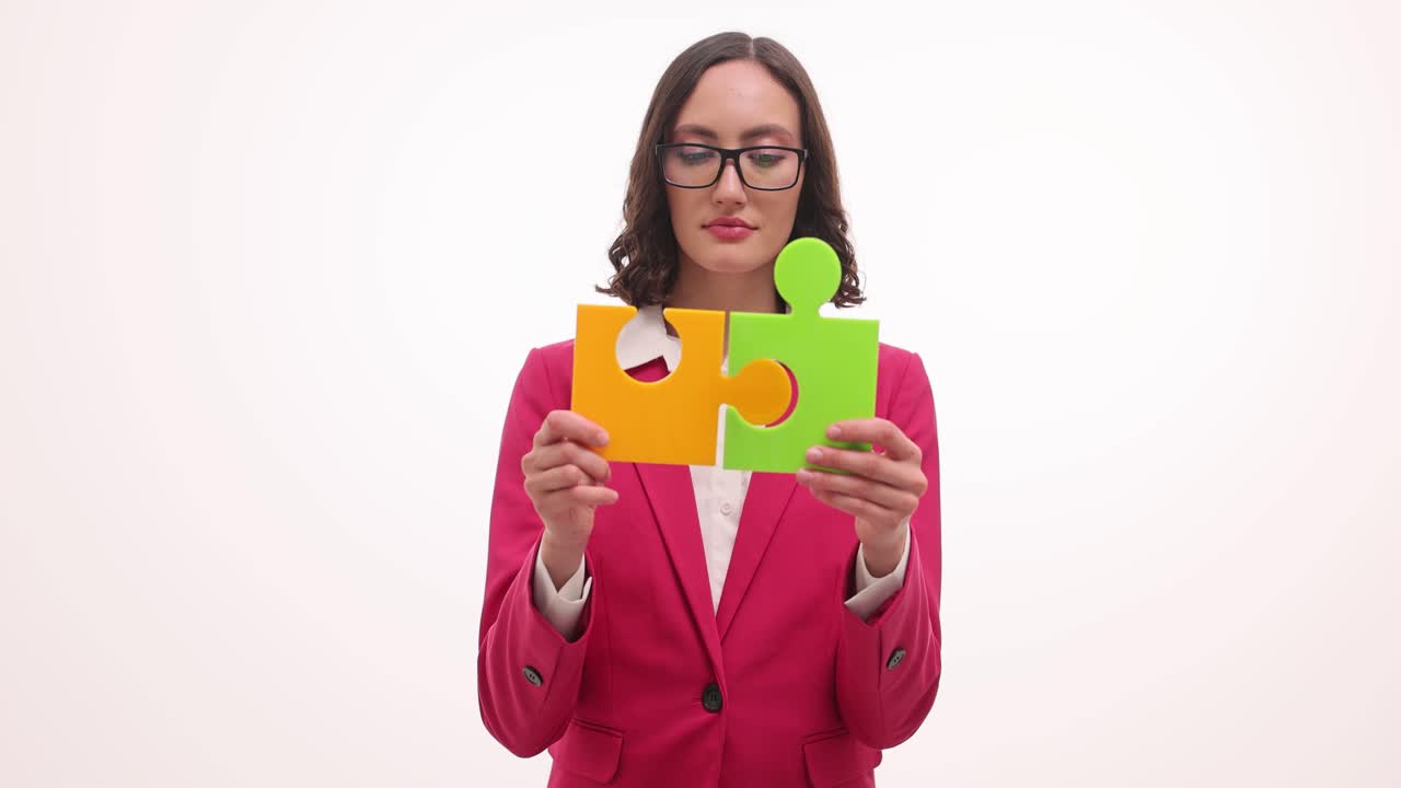 Businesswoman Connecting Puzzle Pieces