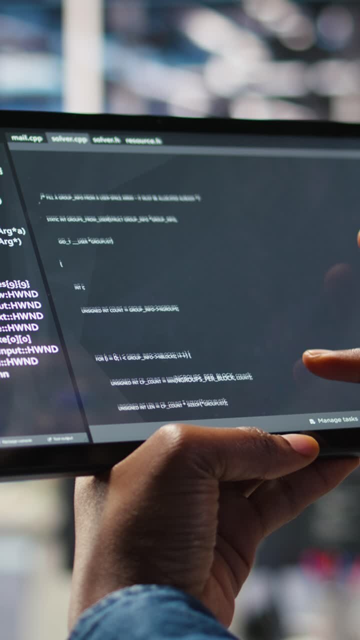 Vertical Video Close Up Of Server Room Programmer Checking Coding On Tablet