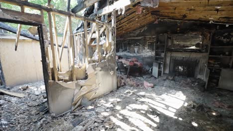 inside the living room of a burnt home after a house fire