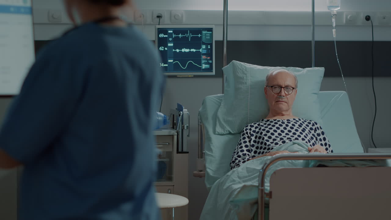 Elderly patient waiting for results in hospital ward bed