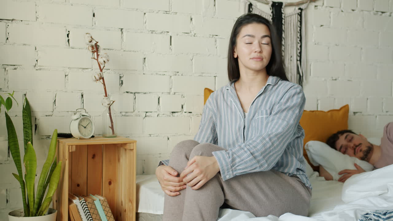 Couple in bedroom: Sad morning