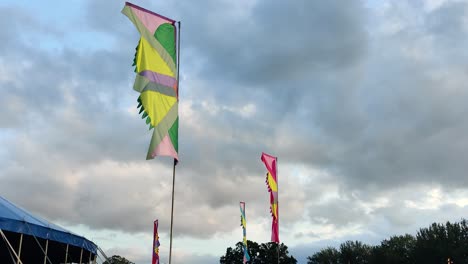 fluorescent festival flags waving in the wind at truck festival 2023