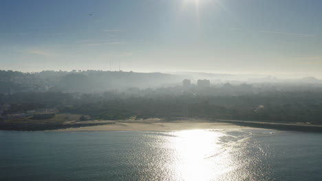from sea to city wide drone shot
