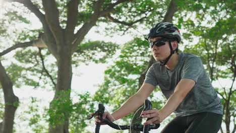 man cycling in a park