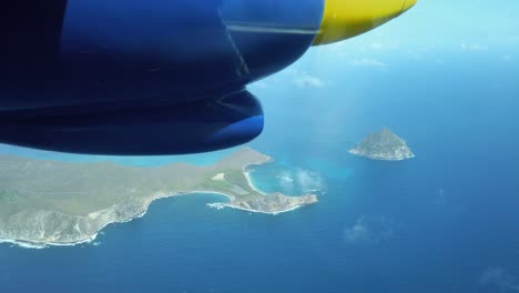 Footage-of-a-bn2-islander-plane-flying-over-the-Caribbean-islands