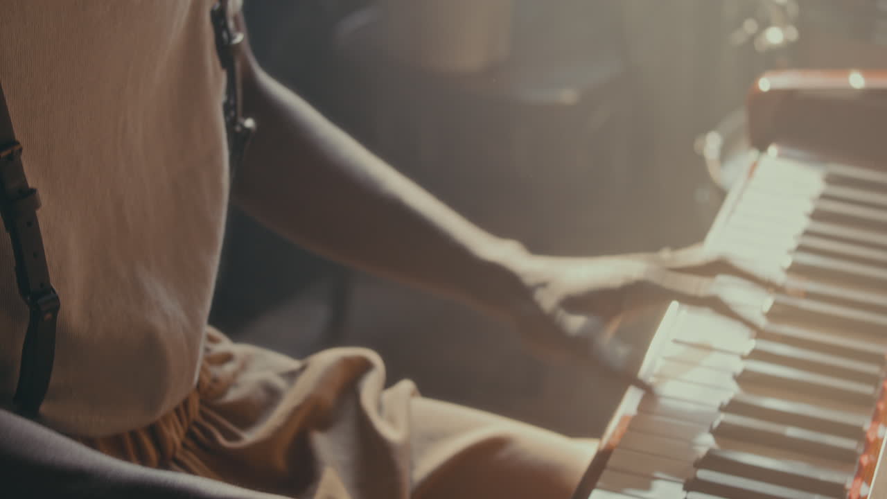 Person Playing Piano Closeup