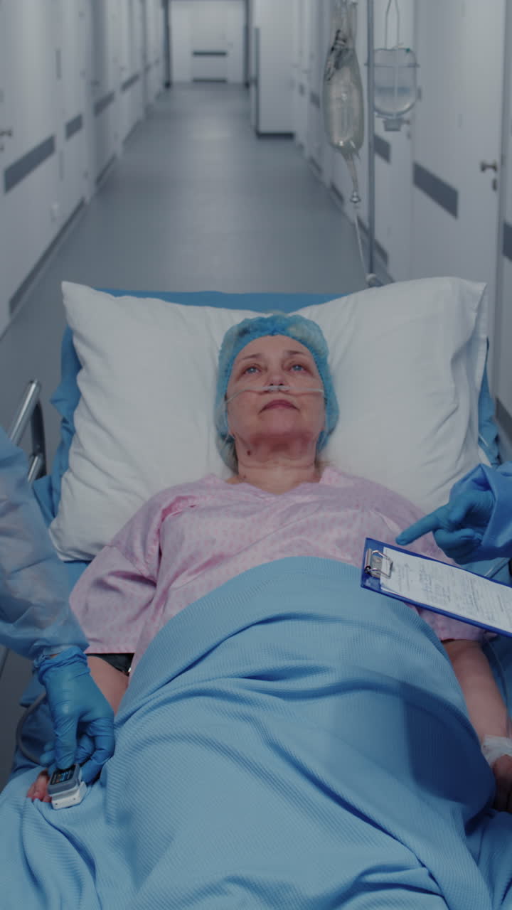 Paramedics examine sick woman in clinic hallway 4k 2025 08 05 02 00 48 utc.mov | african american, aged, assistance, care