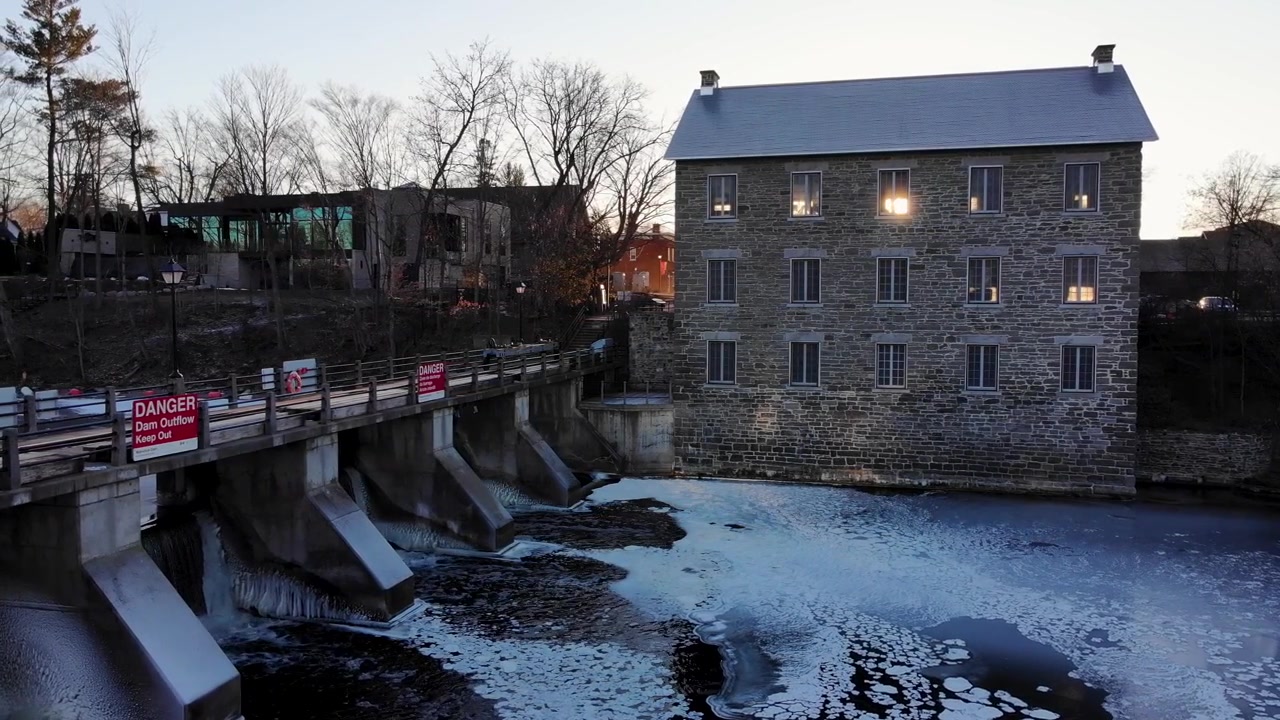 Watson Mill in Manotick. Winter sunset with snow and cool colours.
