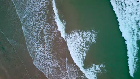 Aerial-wide-shot-of-the-sea-on-Ireland's-North-Coast