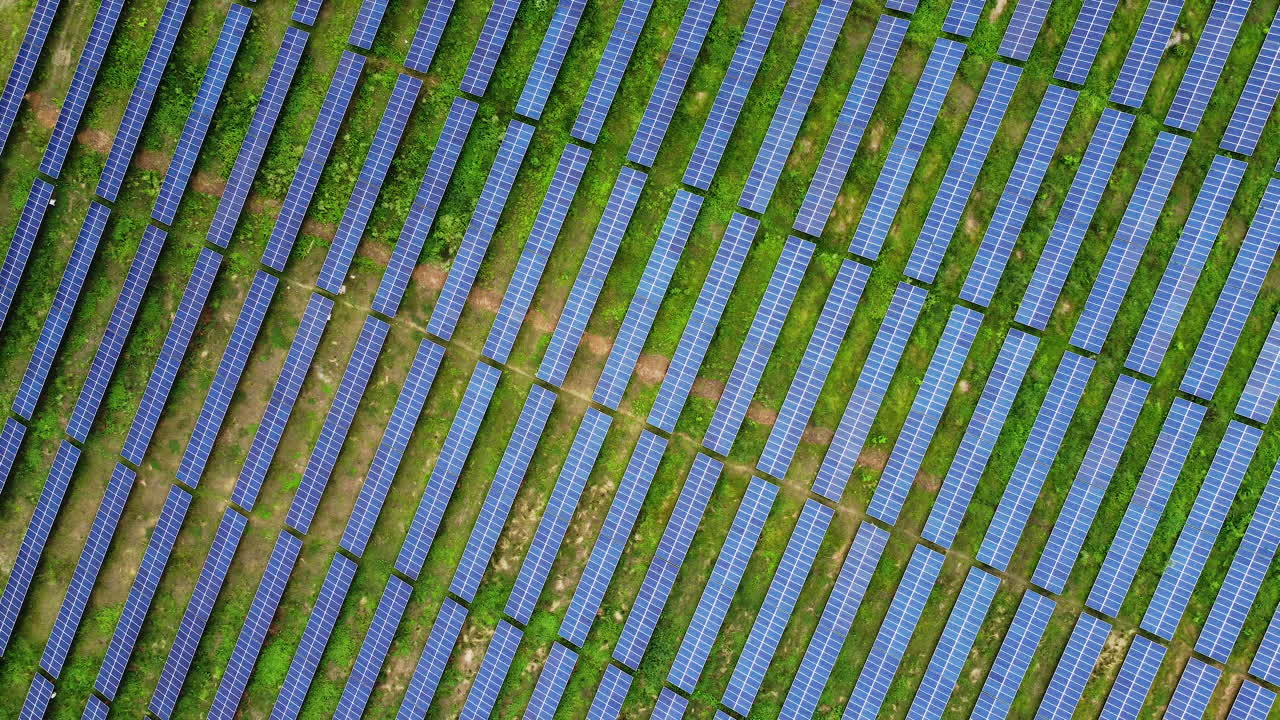 Diagonal Top View Of Photovoltaic Solar Panels In Solar Field On A Sunny Day