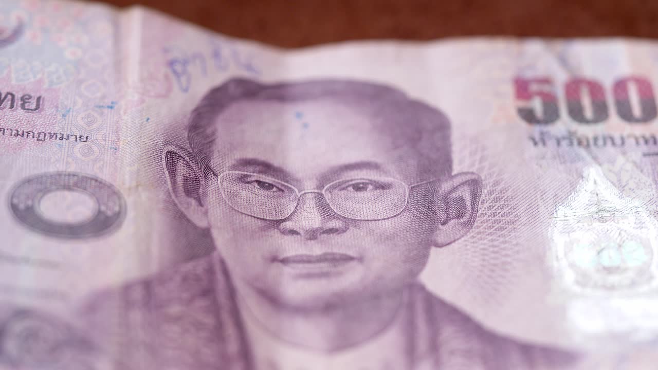 Thailand Baht National official currency - Macro King Bhumibol Adulyadej in the Royal House of Chakri gown