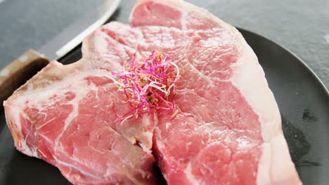 sirloin chop garnished with shredded cabbage