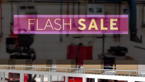 animation of flash sale text over cardboard boxes on conveyor belt in warehouse