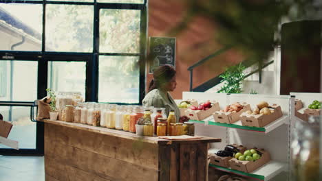 vegan client examining pasta variety stored in reusable jars