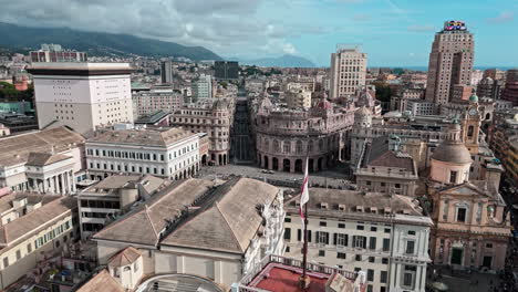 aerial view of historic buildings surrounding piazza de ferrari in genoa, italy