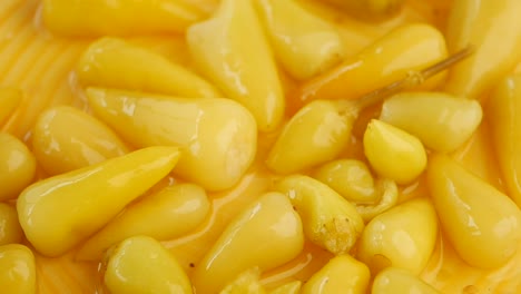 close-up of pickled yellow peppers