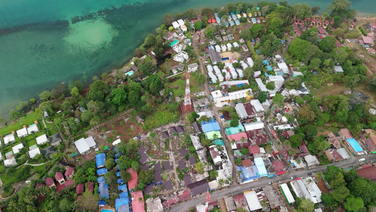 Drone view of Lonely Beach village and tropical sea at Koh Chang the coastline, mountains and jungle