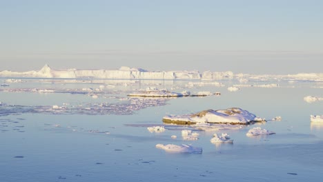 sunlit ice and sea of ilulissat icefjord