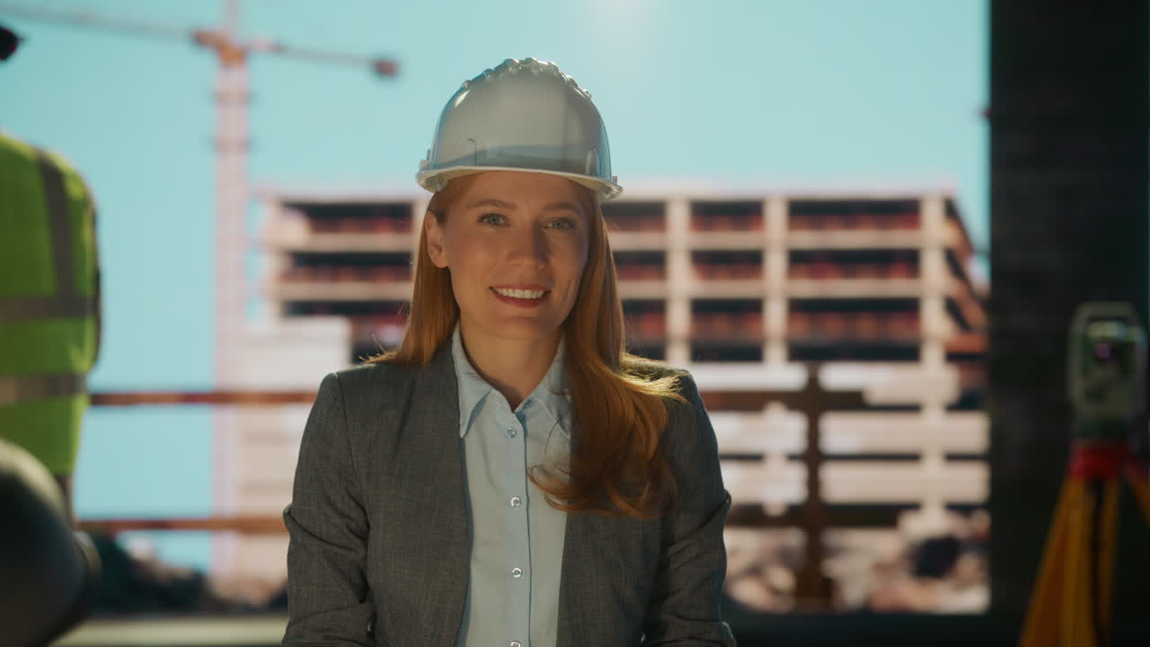 Female Engineer or Architect Working on Construction Site