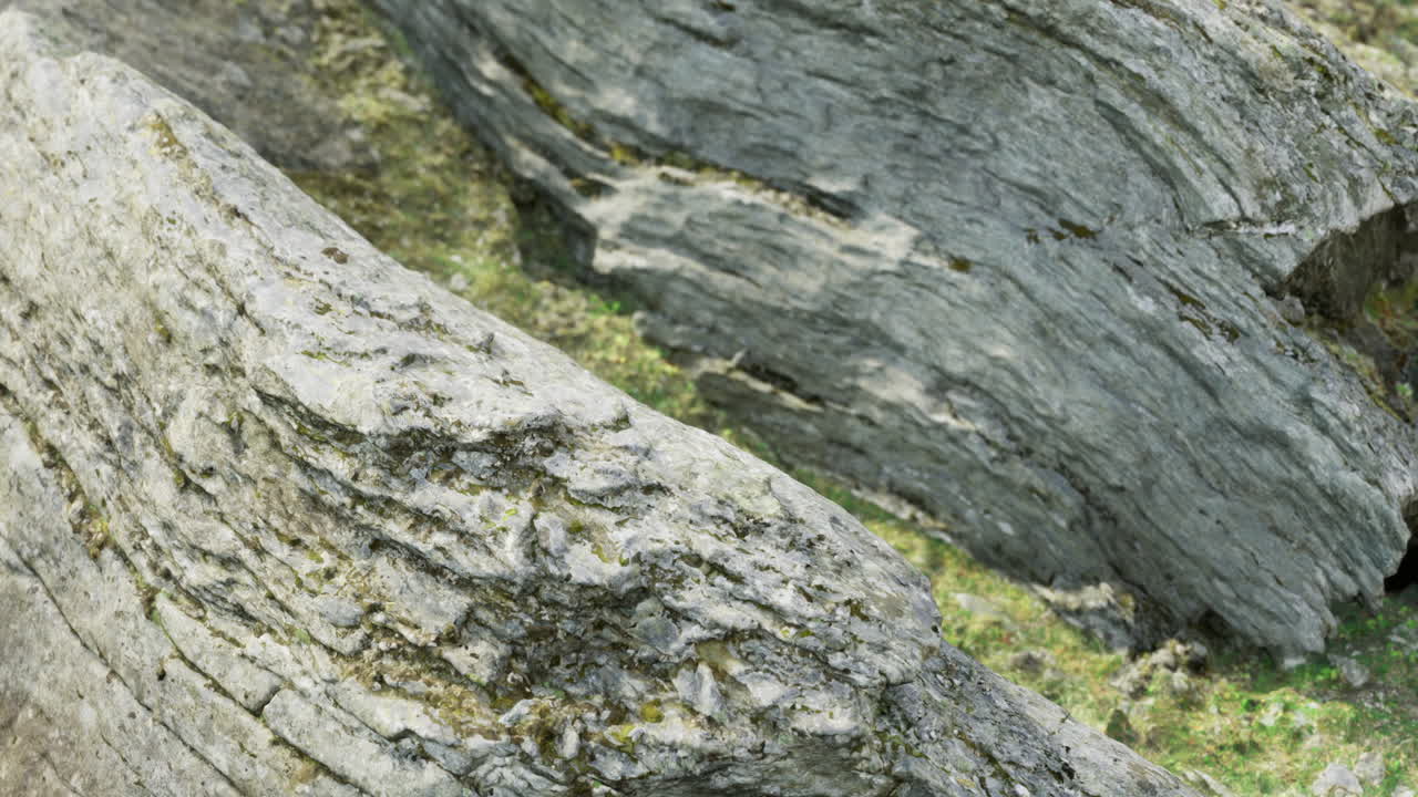 Textured rock formations reveal natures artistry in a serene landscape