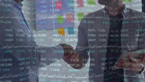 animation of data processing over diverse businessmen shaking hands