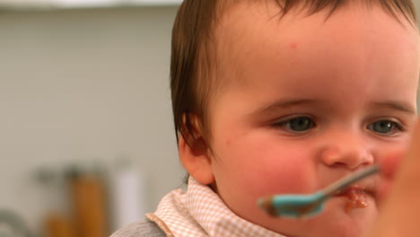 baby boy being fed