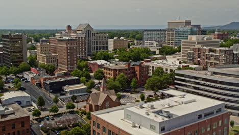 greenville south carolina aerial v26 establishing pull out shot overlooking at downtown cityscape reveals church street ramp traffic - shot with inspire 2, x7 camera - may 2021