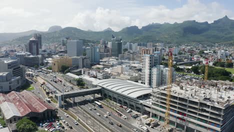 aerial panoramic shot of victoria urban terminal with bus station and skyscraper buildings of port louis mauritius