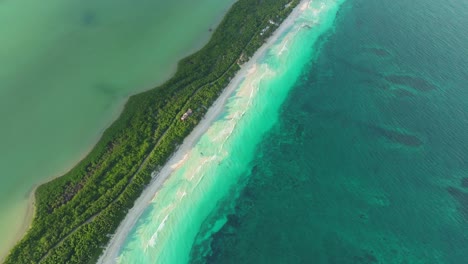 tulum: aerial drone footage of white sand beach and tropical waters