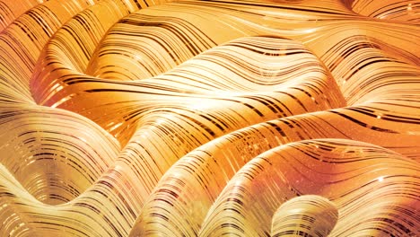 looped abstract background with wavy sparkling golden liquid pattern on shiny glossy surface. viscous yellow fluid like surface of gold foil or brilliant glass. beautiful creative festive backdrop.