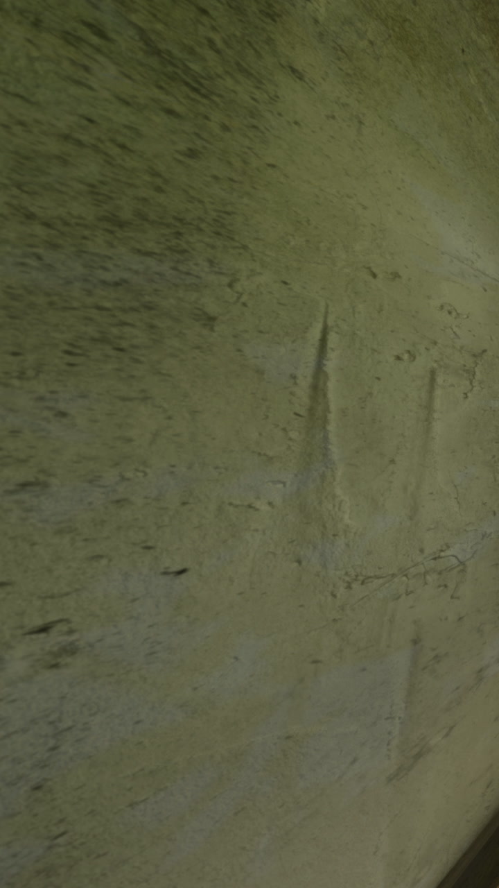 Carving on a wall in an ancient site following a historical pattern