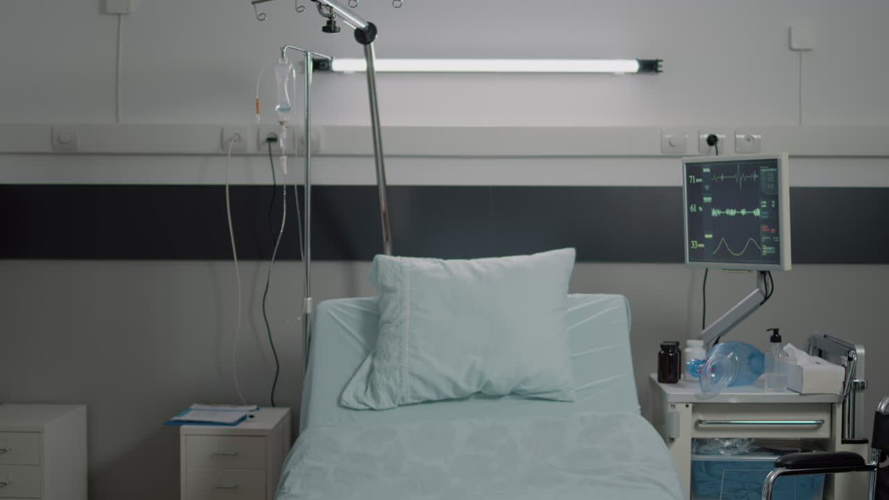 Empty hospital ward with medical equipment and tools