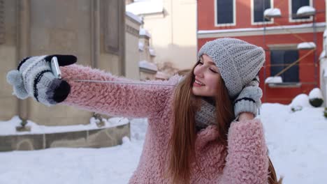 girl making selfies photo, video call on mobile phone, chatting with friends, distance communication