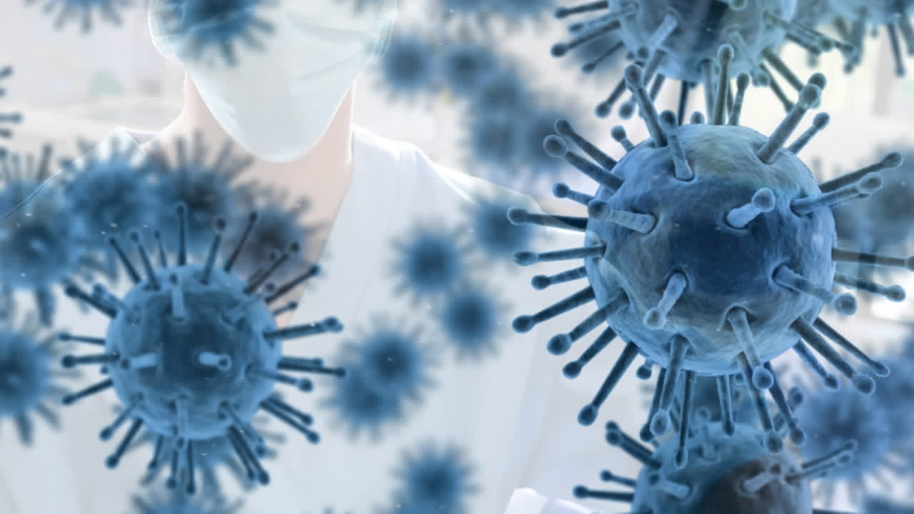 animación de las células de covid-19 flotando sobre el cirujano en la máscara facial