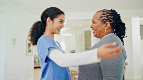 mature patient, nurse and happy people hug
