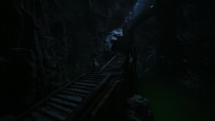 Dark mysterious staircase leading into a cave with faint light above