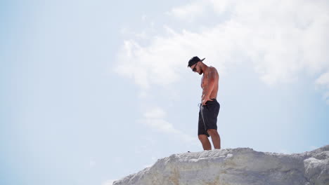 man resting after training. young man enjoying the nature during rest after training