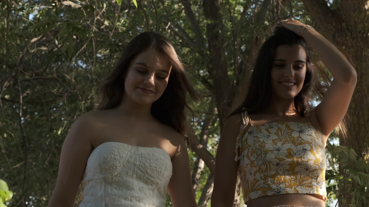 Two young women enjoying a walk outdoors