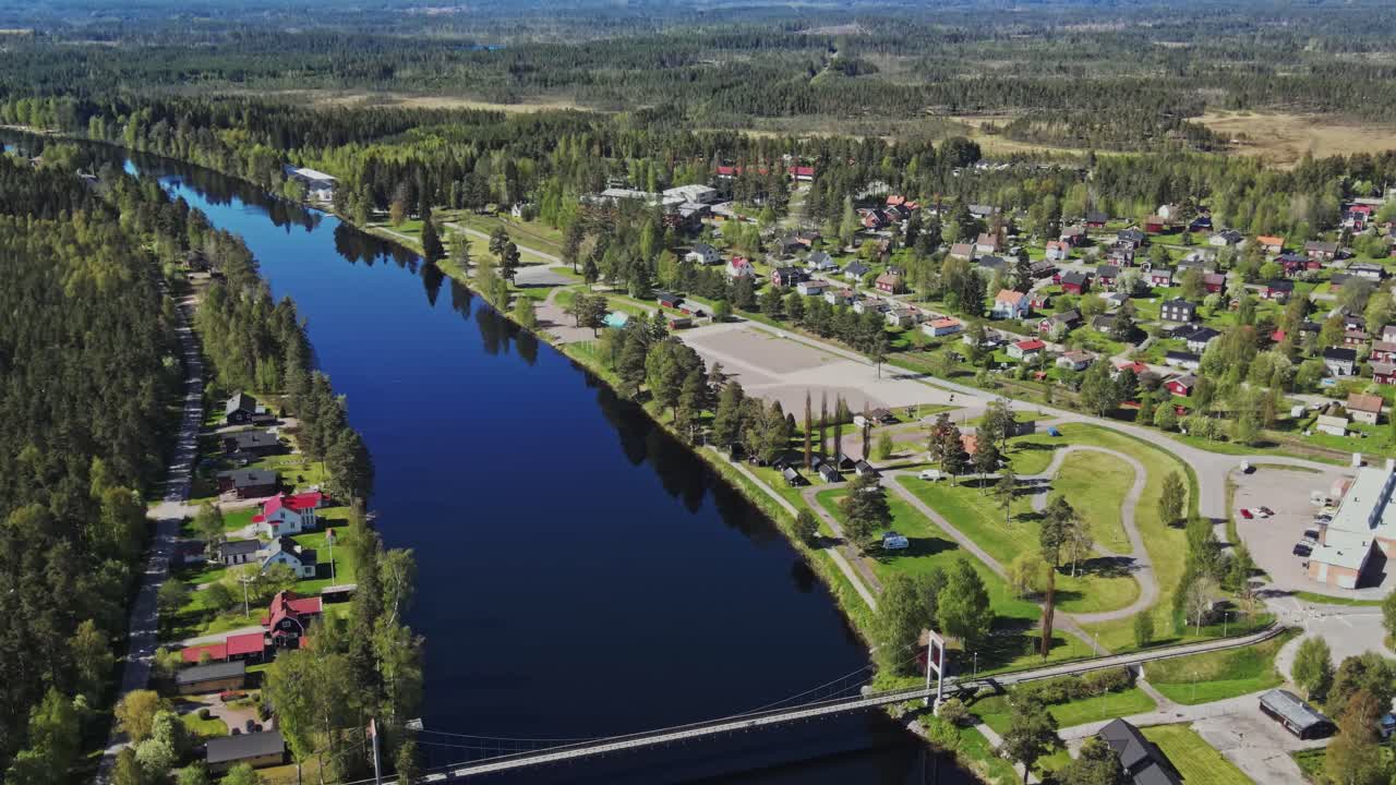 Aerial View Of Vasterdalaven River With Calm Water Near The Town In Dalarna, Sweden.