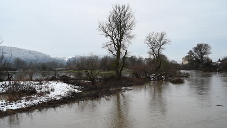 river flood at the floodplains in winter