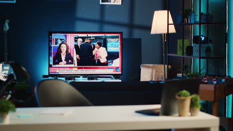 tv news broadcast in neon lit home