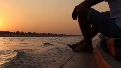 watching the sunset from a boat