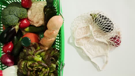 grocery shopping with reusable mesh bag
