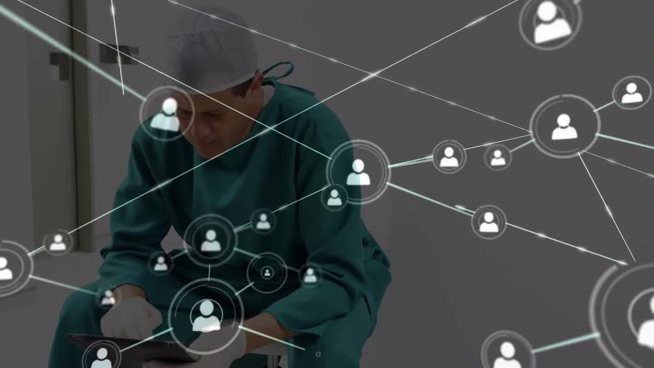 animación de la red de conexiones a través de un cirujano caucásico usando una tableta