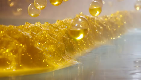golden liquid experiment with bubbles