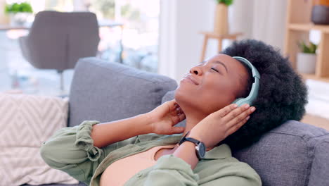 happy, carefree and relaxed woman listening to