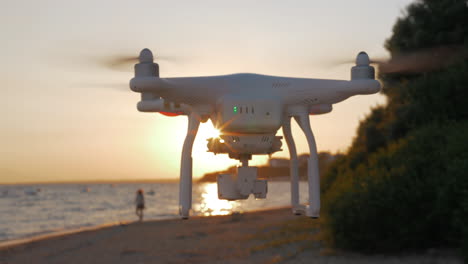 copter flying and shooting scene with sea and sunset