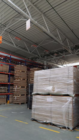 factory for the production of parquet board. manufacture of flooring, parquet processing vertical video