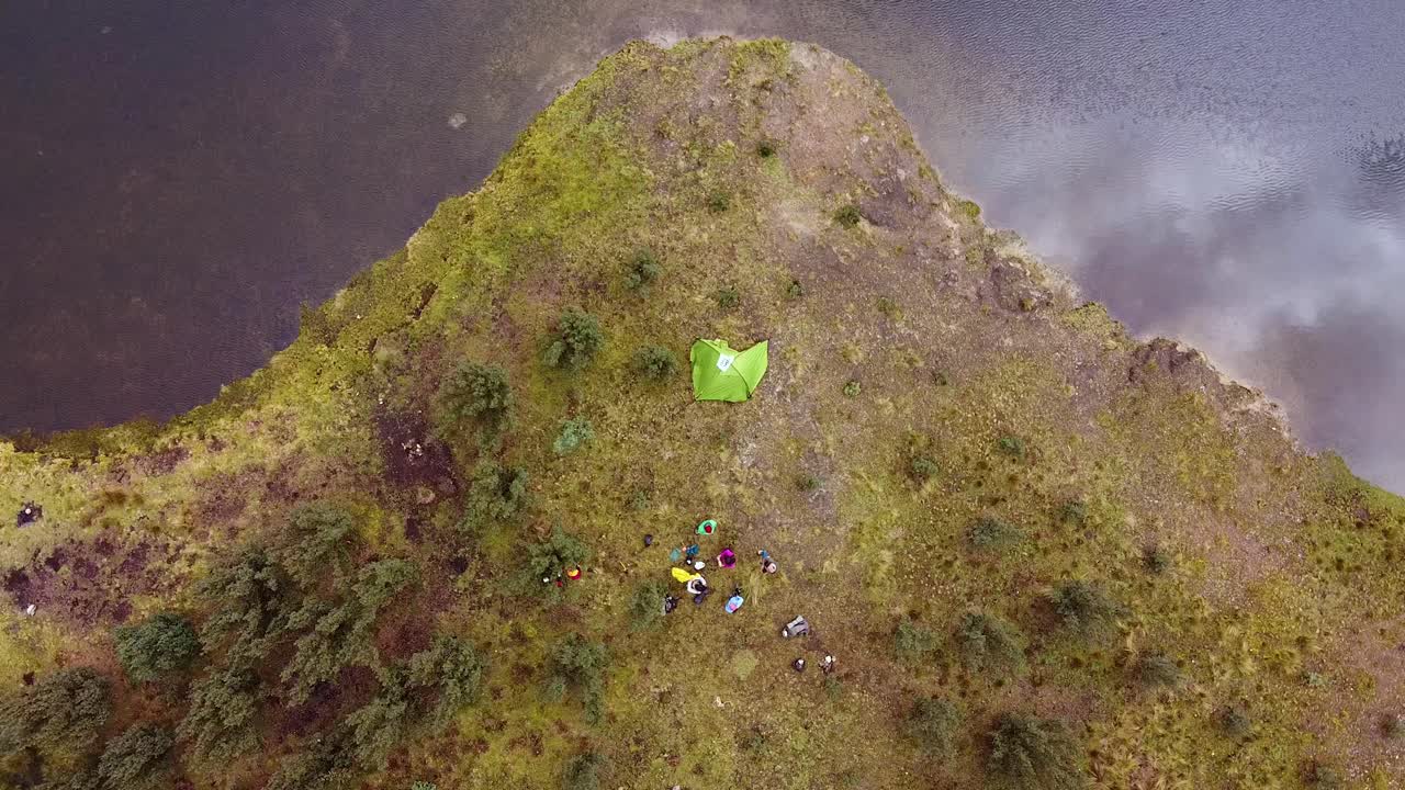 Campers Near A Calm Lake On Mountain Trails In Huaraz, Peru. Aerial Topdown